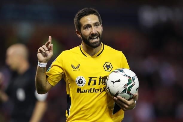 Joao Moutinho of Wolverhampton Wanderers reacts as he prepares to take a corner during the Carabao Cup Second Round match between Nottingham Forest...