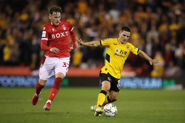 Daniel Podence of Wolverhampton Wanderers controls the ball under pressure from James Garner of Nottingham Forest during the Carabao Cup Second Round...