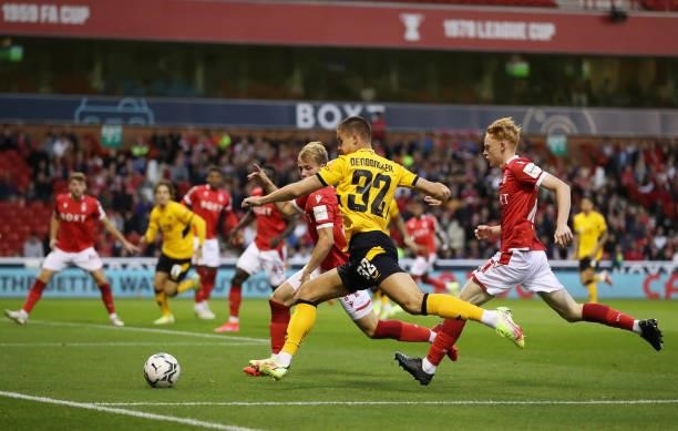 Leander Dendoncker of Wolverhampton Wanderers attempts to cross the ball during the Carabao Cup Second Round match between Nottingham Forest and...