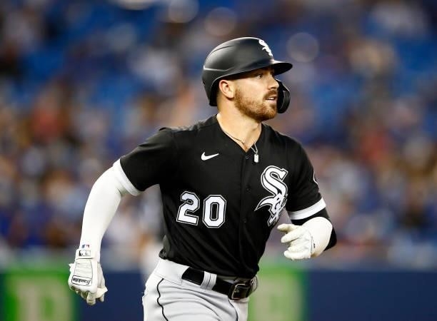 Danny Mendick of the Chicago White Sox runs to first base during a MLB game against the Toronto Blue Jays at Rogers Centre on August 23, 2021 in...