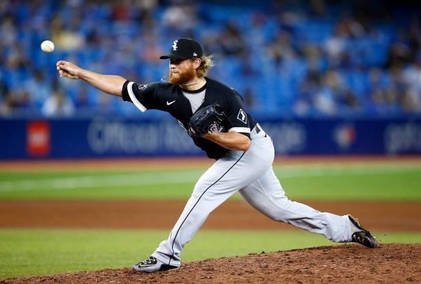 Craig Kimbrel of the Chicago White Sox delivers a pitch during a MLB game against the Toronto Blue Jays at Rogers Centre on August 23, 2021 in...
