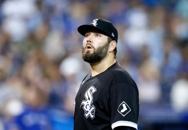 Lance Lynn of the Chicago White Sox looks on as he walks to the dugout during a MLB game against the Toronto Blue Jays at Rogers Centre on August 23,...