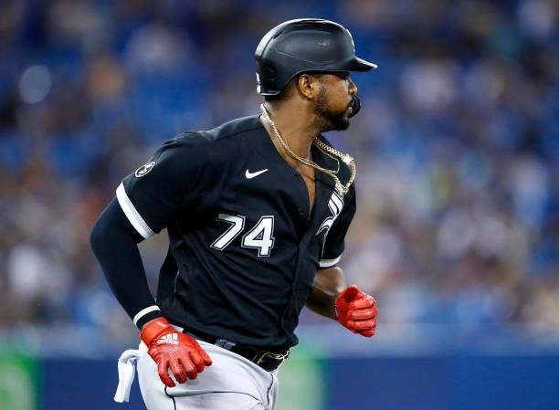 Eloy Jimenez of the Chicago White Sox runs to first base during a MLB game against the Toronto Blue Jays at Rogers Centre on August 23, 2021 in...