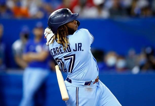 Vladimir Guerrero Jr. #27 of the Toronto Blue Jays bats during a MLB game against the Chicago White Sox at Rogers Centre on August 23, 2021 in...