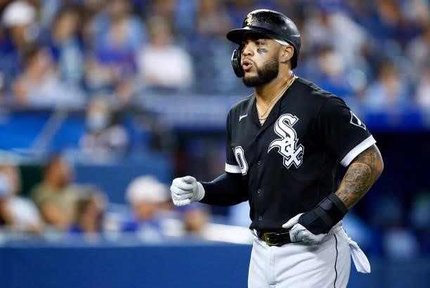 Yoan Moncada of the Chicago White Sox scores a run on a single by Andrew Vaughn in the sixth inning during a MLB game against the Toronto Blue Jays...