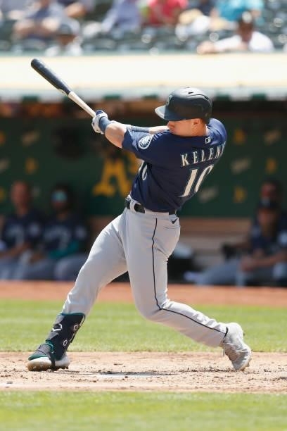 Jarred Kelenic of the Seattle Mariners hits an RBI single in the top of the second inning against the Oakland Athletics at RingCentral Coliseum on...