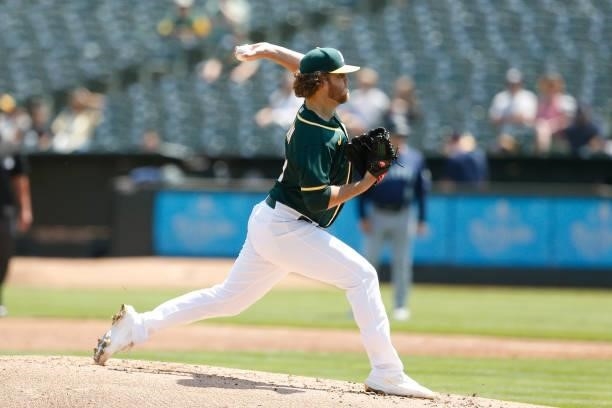 Cole Irvin of the Oakland Athletic pitches in the top of the second inning against the Seattle Mariners at RingCentral Coliseum on August 24, 2021 in...
