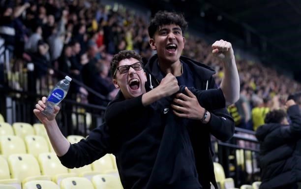 Watford fans celebrate after the Carabao Cup second round match between Watford and Crystal Palace at Vicarage Road Stadium on August 24, 2021 in...