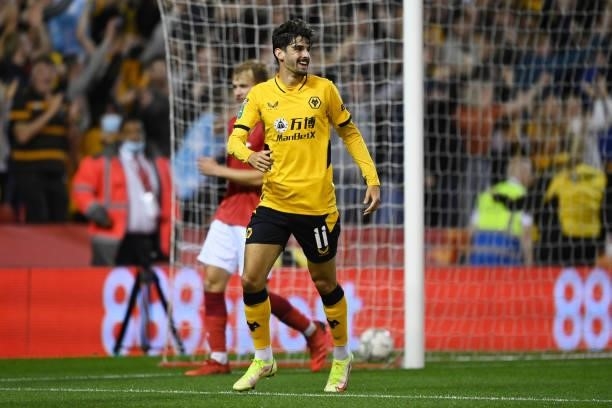 Francisco Trincao of Wolverhampton Wanderers celebrates after scoring their team's third goal during the Carabao Cup Second Round match between...