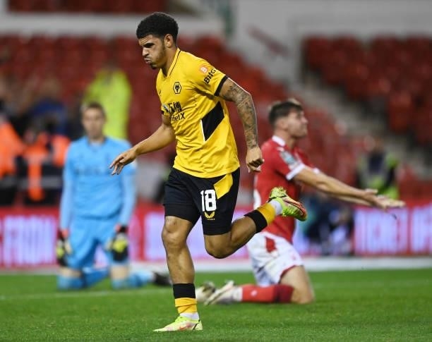 Morgan Gibbs-White of Wolverhampton Wanderers celebrates after scoring their team's fourth goal during the Carabao Cup Second Round match between...