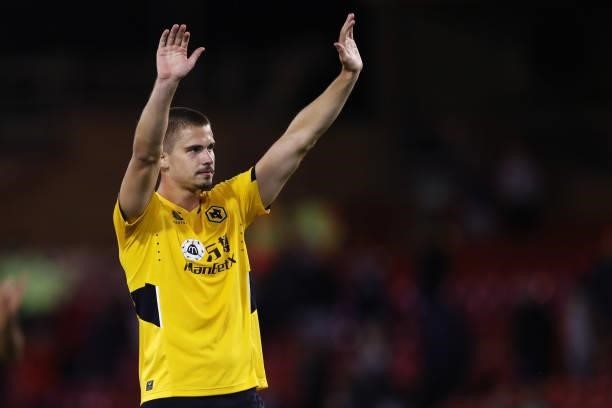 Leander Dendoncker of Wolverhampton Wanderers waves to the fans at full-time after the Carabao Cup Second Round match between Nottingham Forest and...