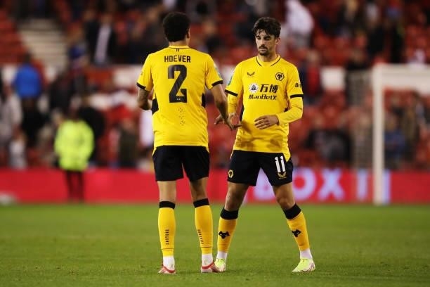 Francisco Trincao and Ki-Jana Hoever of Wolverhampton Wanderers celebrate their team's victory at full-time after the Carabao Cup Second Round match...