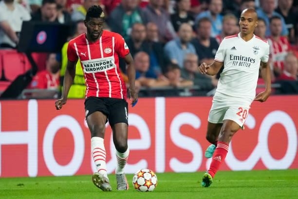 Ibrahim Sangare of PSV and Joao Mario of Benfica during the UEFA Champions League Play-Offs Leg Two match between PSV and Benfica at Philips Stadion...