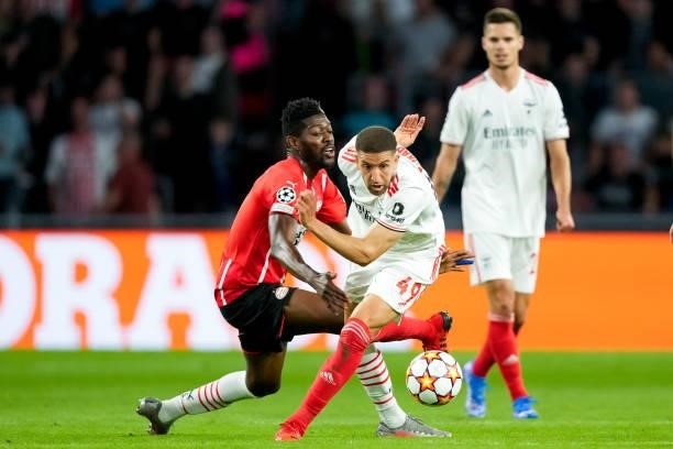 Ibrahim Sangare of PSV and Adel Taarabt of Benfica battle for possession during the UEFA Champions League Play-Offs Leg Two match between PSV and...