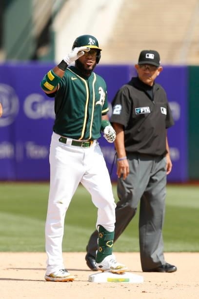 Elvis Andrus of the Oakland Athletics reacts after hitting a double in the bottom of the seventh inning against the Seattle Mariners at RingCentral...