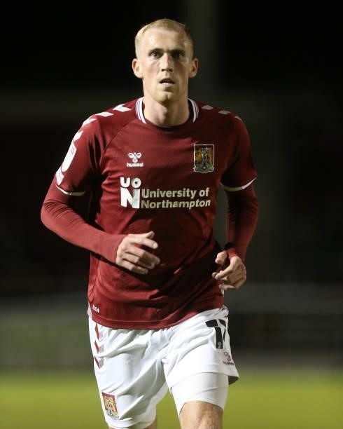Mitch Pinnock of Northampton Town in action during the Carabao Cup 2nd Round match between Northampton Town and AFC Wimbledon at Sixfields on August...