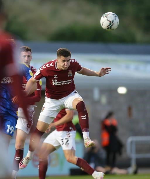 Aaron McGowan of Northampton Town in action during the Carabao Cup 2nd Round match between Northampton Town and AFC Wimbledon at Sixfields on August...