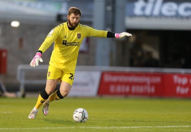 Jonny Maxted of Northampton Town in action during the Carabao Cup 2nd Round match between Northampton Town and AFC Wimbledon at Sixfields on August...