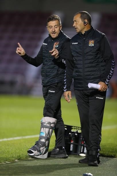 Northampton Town manager Jon Brady and assistant manager Colin Calderwood during the Carabao Cup 2nd Round match between Northampton Town and AFC...
