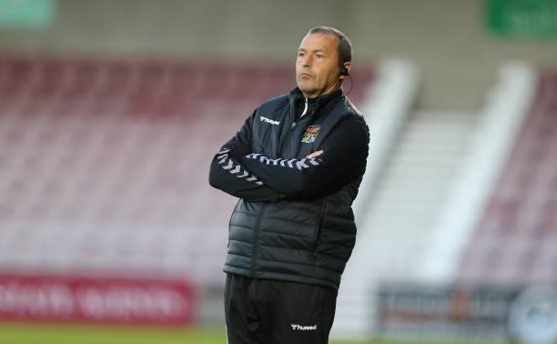 Northampton Town assistant manager Colin Calderwood looks on during the Carabao Cup 2nd Round match between Northampton Town and AFC Wimbledon at...