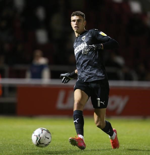 Nikola Tzanev of AFC Wimbledon in action during the Carabao Cup 2nd Round match between Northampton Town and AFC Wimbledon at Sixfields on August 24,...