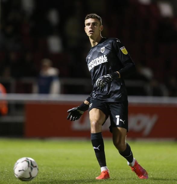 Nikola Tzanev of AFC Wimbledon in action during the Carabao Cup 2nd Round match between Northampton Town and AFC Wimbledon at Sixfields on August 24,...