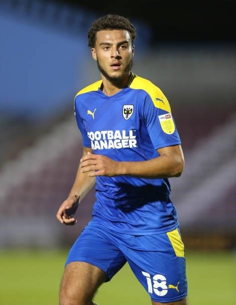 Nesta Guinness-Walker of AFC Wimbledon in action during the Carabao Cup 2nd Round match between Northampton Town and AFC Wimbledon at Sixfields on...