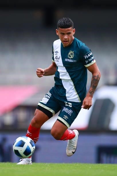 Maximiliano Araujo of Puebla drives the ball during the 6th round match between Pumas UNAM and Puebla as part of the Torneo Grita Mexico A21 Liga MX...