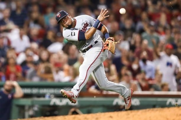 Luis Arraez of the Minnesota Twins throws to first base during a game against the Boston Red Sox at Fenway Park on August 24, 2021 in Boston,...