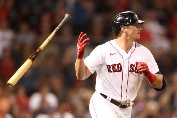Hunter Renfroe of the Boston Red Sox tosses his bat after hitting a three-run home run in the fourth inning of a game against the Minnesota Twins at...