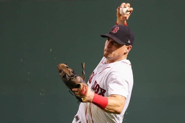 Enrique Hernandez of the Boston Red Sox makes a throw during a game against the Minnesota Twins at Fenway Park on August 24, 2021 in Boston,...