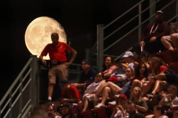 Full moon is present during a game between the Boston Red Sox and the Minnesota Twins at Fenway Park on August 24, 2021 in Boston, Massachusetts.