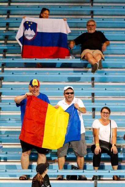 Fans hold up country flags as they cheer for Irina-Camelia Begu of Romania and Polona Hercog of Slovenia during their match on day 3 of the Cleveland...