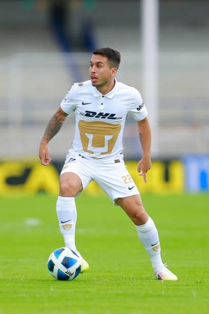 Cristian Damian Battocchio of Pumas drives the ball during the 6th round match between Pumas UNAM and Puebla as part of the Torneo Grita Mexico A21...