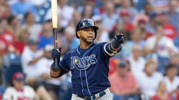 Nelson Cruz of the Tampa Bay Rays points against the Philadelphia Phillies at Citizens Bank Park on August 24, 2021 in Philadelphia, Pennsylvania....