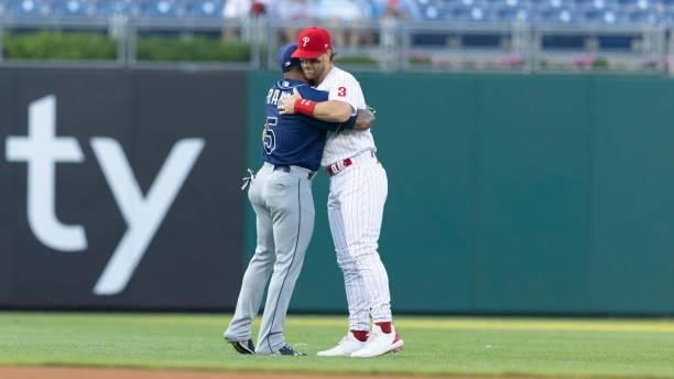 Wander Franco of the Tampa Bay Rays hugs Bryce Harper of the Philadelphia Phillies prior to the game at Citizens Bank Park on August 24, 2021 in...