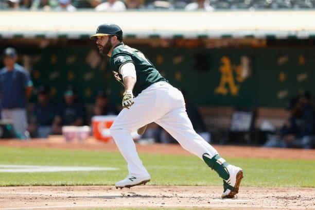 Mitch Moreland of the Oakland Athletics at bat against the Seattle Mariners at RingCentral Coliseum on August 24, 2021 in Oakland, California.
