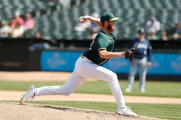 Puk of the Oakland Athletics pitches against the Seattle Mariners at RingCentral Coliseum on August 24, 2021 in Oakland, California.