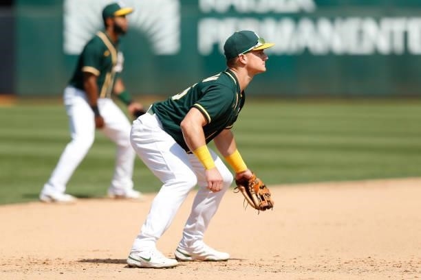 Matt Chapman of the Oakland Athletics fields at third base against the Seattle Mariners at RingCentral Coliseum on August 24, 2021 in Oakland,...