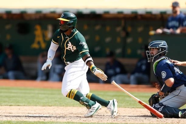 Josh Harrison of the Oakland Athletics at bat against the Seattle Mariners at RingCentral Coliseum on August 24, 2021 in Oakland, California.