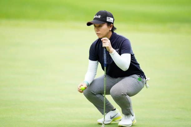 Megumi Shimokawa of Japan prepares to putt on the 17th green during the first round of the San-In Goen Musubi Ladies at Daisenheigen Golf Club on...