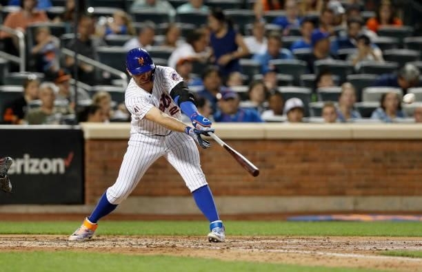 Pete Alonso of the New York Mets connects on a sixth inning base hit against the San Francisco Giants at Citi Field on August 24, 2021 in New York...