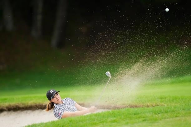 Mirai Hamasaki of Japan hits out of the bunker on the 17th hole during the first round of the San-In Goen Musubi Ladies at Daisenheigen Golf Club on...