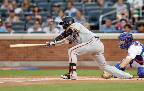 Buster Posey of the San Francisco Giants in action against the New York Mets at Citi Field on August 24, 2021 in New York City. The Giants defeated...