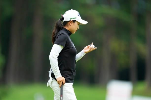Hana Lee of South Korea checks her ball on the 17th green during the first round of the San-In Goen Musubi Ladies at Daisenheigen Golf Club on August...