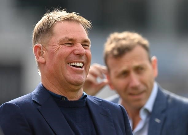 Shane Warne of Sky television laughs with Michael Atherton in the background before the 3rd LV= Test Match between England and India at Emerald...