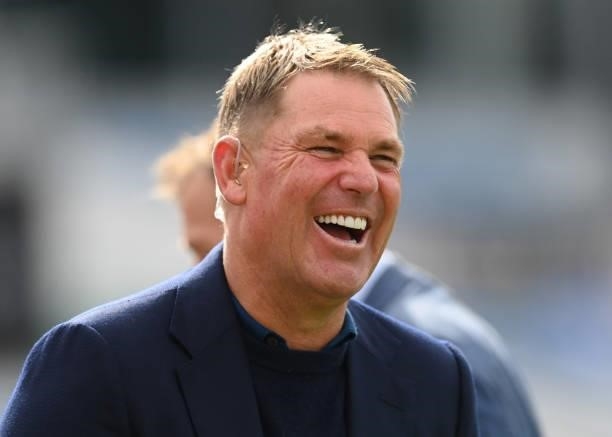Shane Warne of Sky television laughs before the 3rd LV= Test Match between England and India at Emerald Headingley Stadium on August 25, 2021 in...