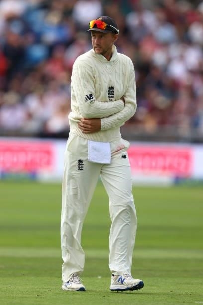 England captain Joe Root leaves the field after taking a blow to a finger whilst fielding during day one of the Third Test Match between England and...