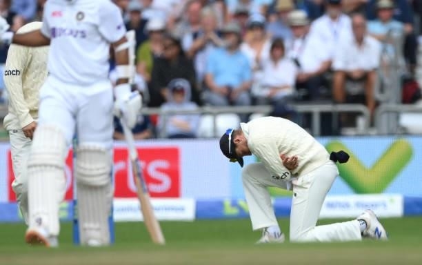 England captain Joe Root reacts after injuring his thumb in the slips during day one of the Third Test Match between England and India at Emerald...