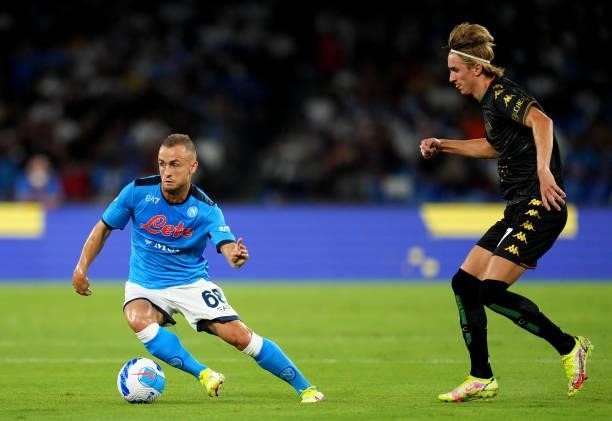 Stanislav Lobotka of SSC Napoli competes for the ball with Dennis Johnsen of Venezia FC ,during the Serie A match between SSC Napoli v Venezia FC at...